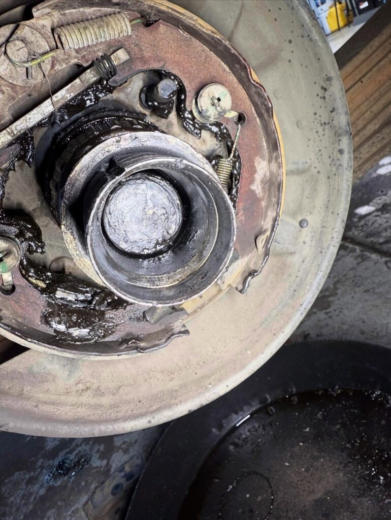 LandCruiser axle housing end with the broken axle still inside, brake backing plate visible